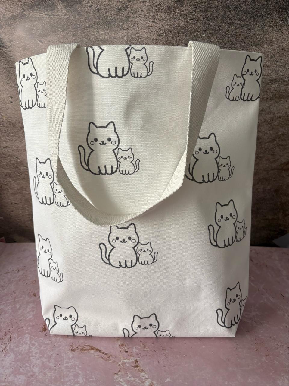 Brigitte cotton tote in a black cat print.