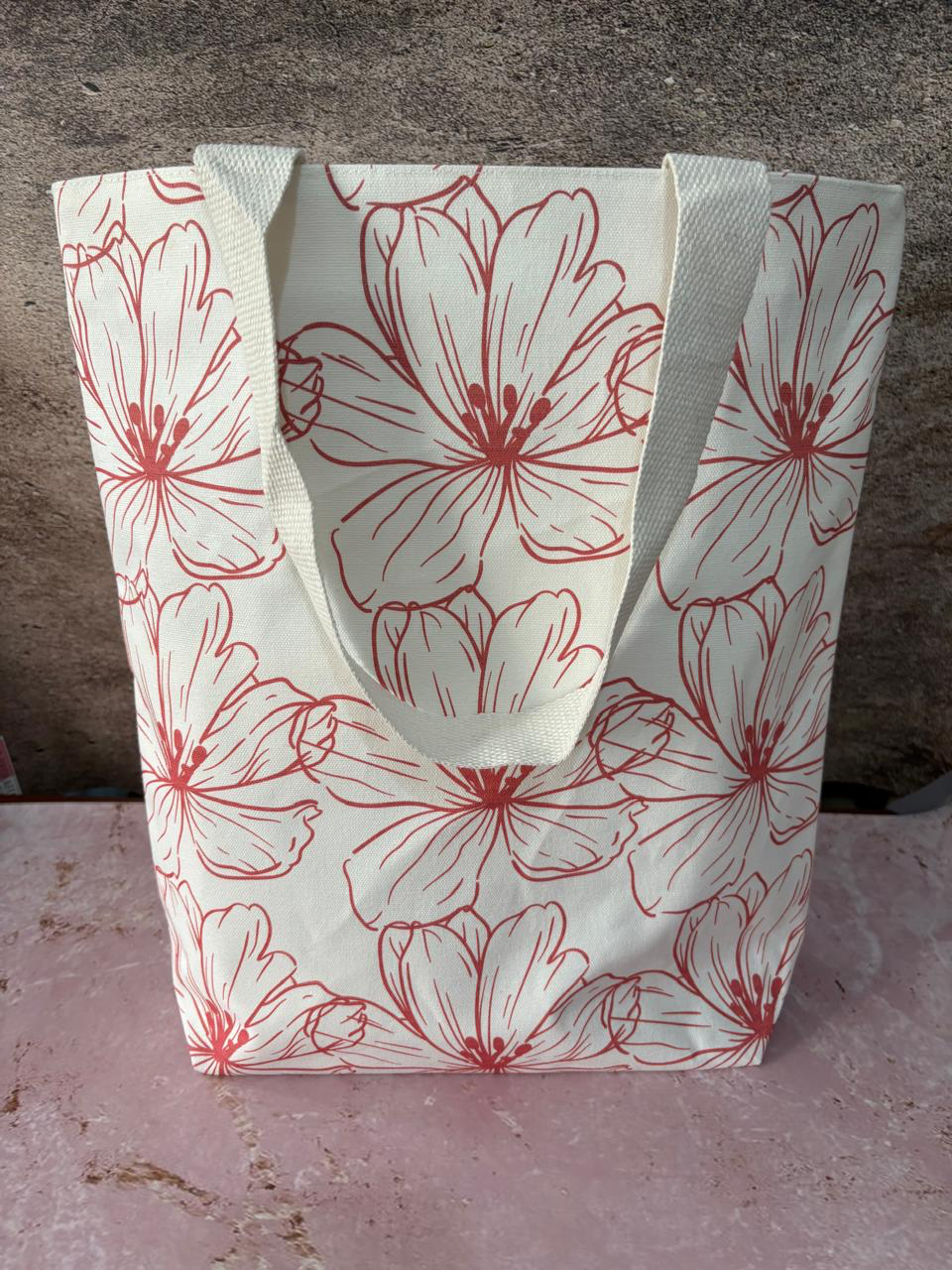 Brigitte cotton tote in a burgundy floral line print.